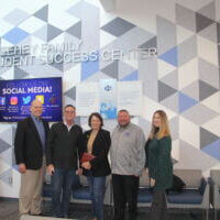 After a meeting at the Iowa Central Community College campus to discuss economic development, meeting participants took a photograph together, from left to right: David Fierke, City Manager, Fort Dodge, Iowa; Mark Campbell, Webster County Supervisor; Theresa Greenfield, United States Department of Agriculture (USDA) Rural Development State Director in Iowa; Dr. Jesse Ulrich, President, Iowa Central Community College; Astra Ferris, CEO, Greater Fort Dodge Growth Alliance. December 14, 2023. USDA media.